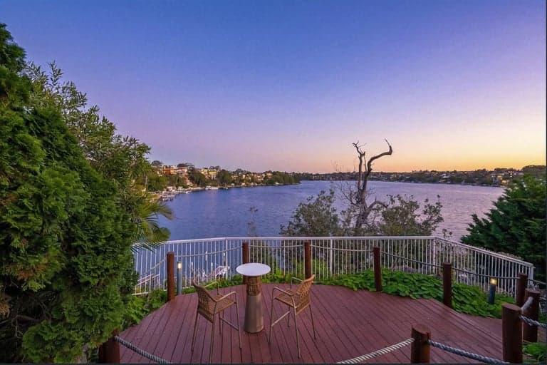 Outdoor timber deck flooring overlooking a Sydney harbour sunset