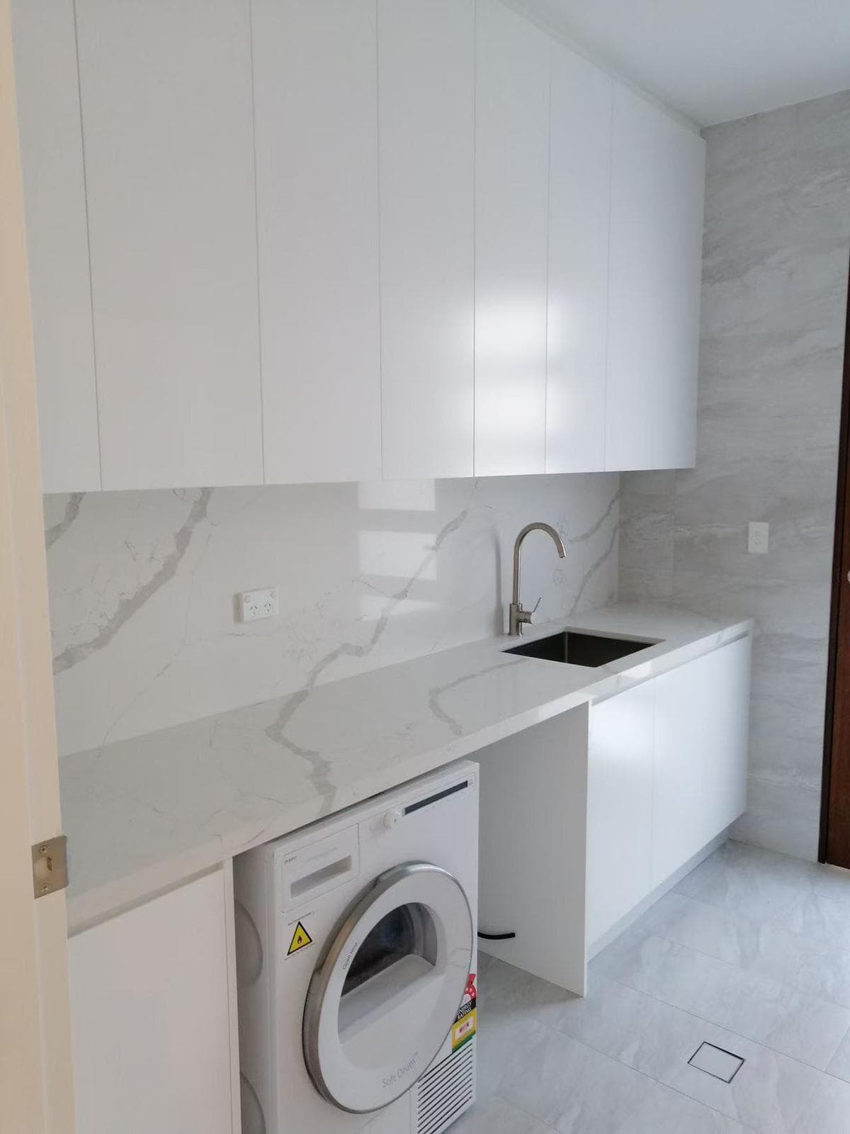 Laundry renovation in Sydney by Crown and Stone — 1